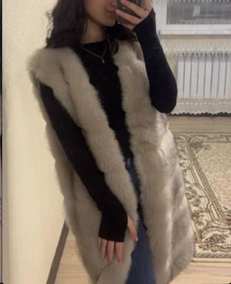 Меховая жилетка женская