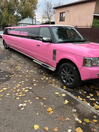 Розовый Cadillac escalade