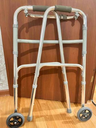 Продам взрослый ходунок шагающий