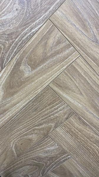 Продам ламинат Елочка ,замок Uniclic