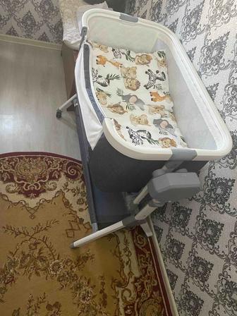 Продаем электронную кровать новую.Трансформируется в приставную к кровати.