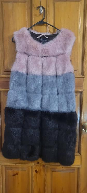 Теплая жилетка