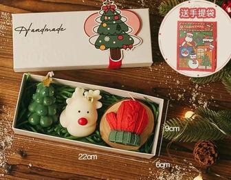 Новогодние подарки. Рождественские свечи в подарочной упаковке