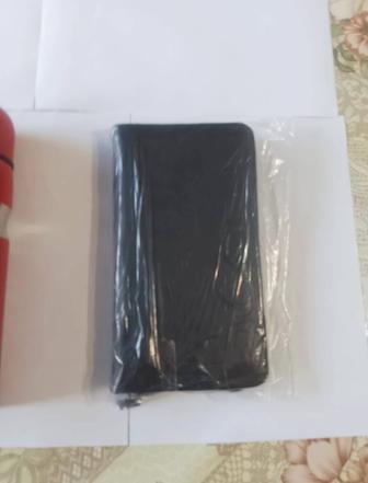 Продам барсетка черного цвета.
