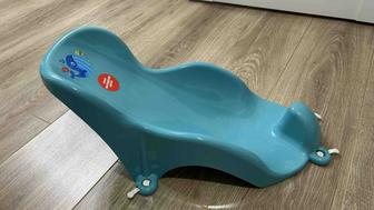 Отдам бесплатно подгузники Huggies 1 и 3(пол пачки) и горка для купания