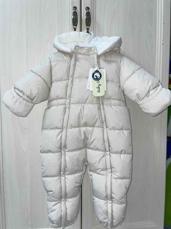 Продам новый детский комбинезон