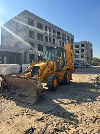 Уборка снега эсковатор погрузчик