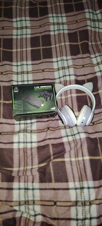 Продам приставку game stick lite 4k и блютуз наушники