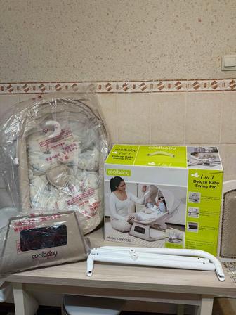 Электрокачели