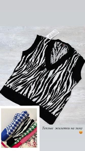 Теплые желетки на зиму