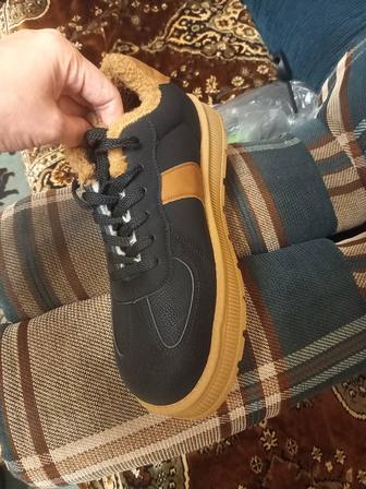 Продам зимние кроссовки