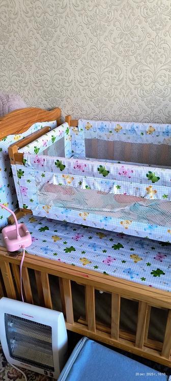 Детская кроватка с люлькой