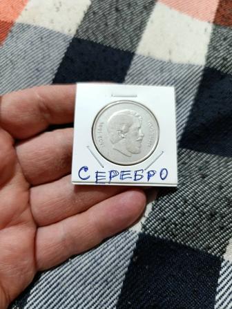 Серебряная монета в люксе