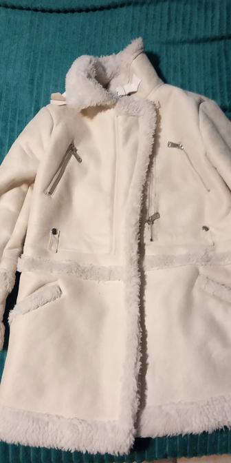 Продам дубленку цвет молочный