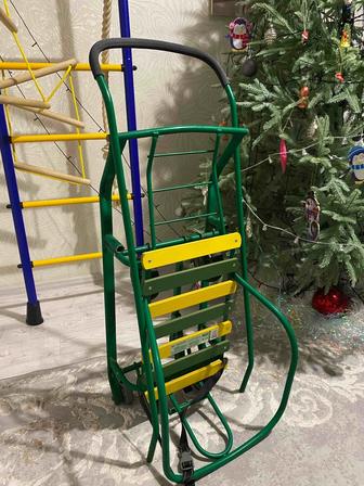 Продам детские санки на колесиках