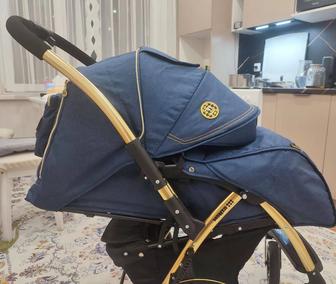 Коляска прогулочная с перекидной ручкой.