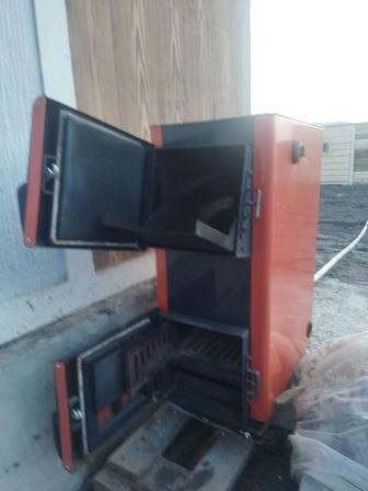 Продам новый котел на твердом топливе.