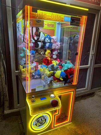 Игровой аппарат хватайка