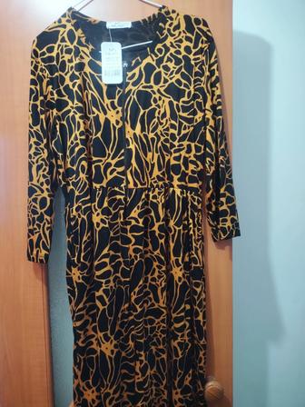 Женская одежда платья