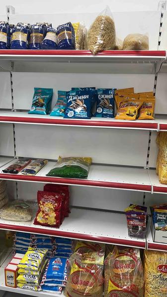 Стеллажи для продуктового магазин. Одна секция по 25000,в наличии 10