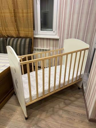 Детская кроватка (колесо-качалка)