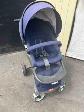 Коляска stokke