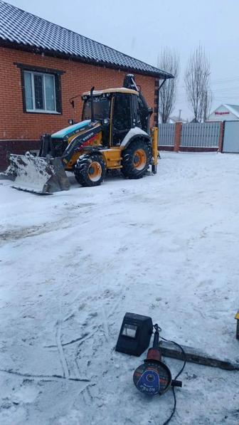 Услуги экскаватора погрузчика чистка снега и вывоз и другие услуги земляных