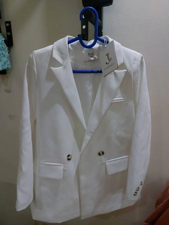 Продам новые костюмы Турция