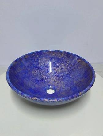 Дизайнерские каменные круглые раковины для ванной комнаты.