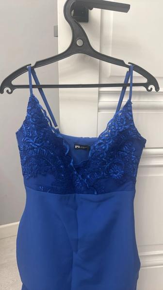 Продам вечернее коктейльное платье . Цвет темно синий.В отличном состоянии