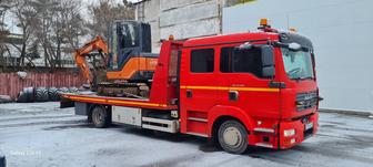 Эвакуатор со сдвижной платформой.