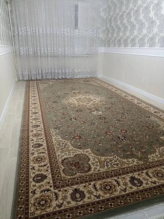 Сатылымда кілем.