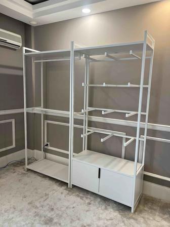 Торговое оборудование для магазина одежды Стойки