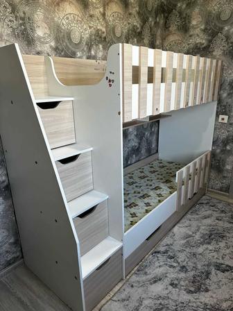 Детская кроватка двухъярусная