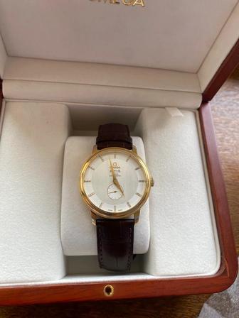 Продам золотые мужские часы OMEGA оригинальные, с бриллиантами.
