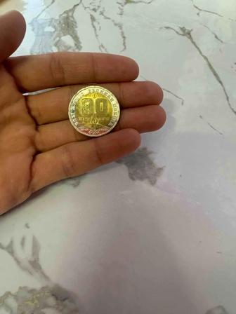Продам монетку новый 80лет 200тенге