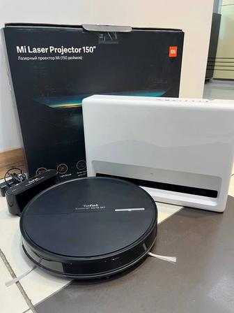 Робот пылесос Tefal и рядом проектор Mi