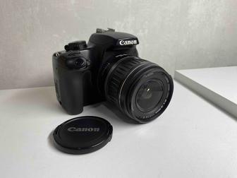 Продам зеркальный фотоаппарат Canon 1000D