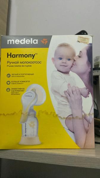 Продам ручной молокоотсос от фирмы MEDELA