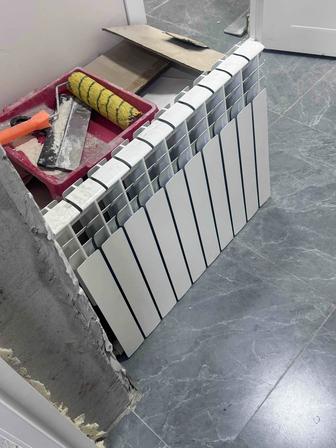 Продам радиатор отопления (новый, снят в новостройке)