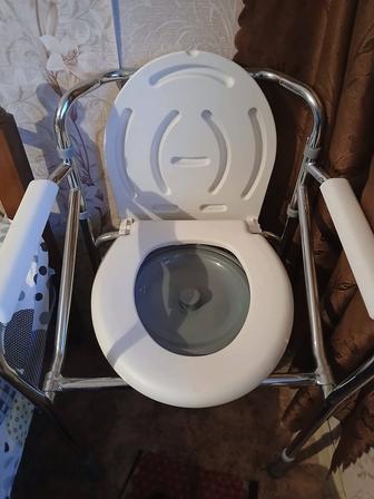Продам кресло туалет новое