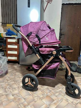 Детская прогулочная коляска