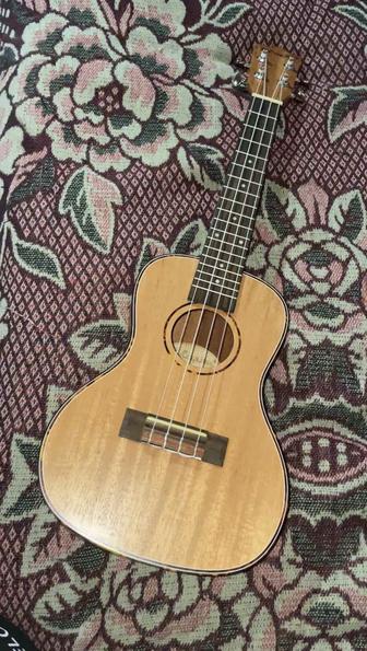 Инструмент укулеле