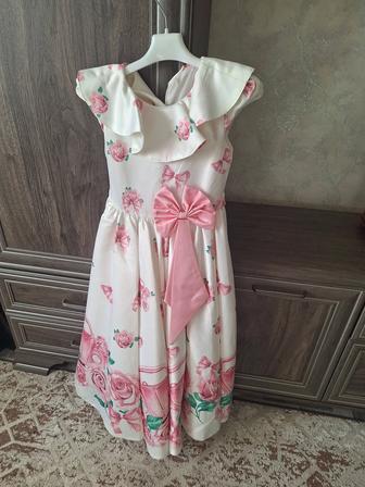 Продам новое атласное платье для девочки 7-8 лет производство ОАЭ