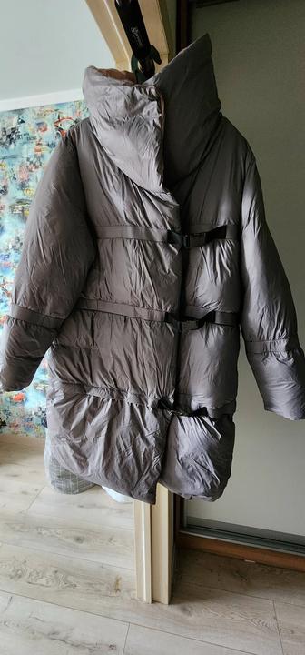 Продам пуховик демисезонный,размер 50,2 в1,отстегивается и делается курткой