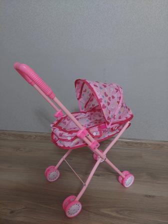 Игрушечная коляска
