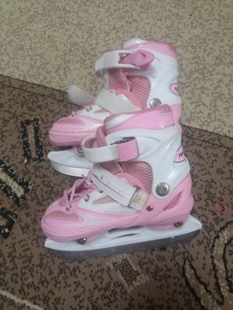 Продам коньки роликовые