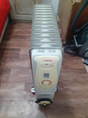 Продам обогреватель и монету сто тенге 30ти летия