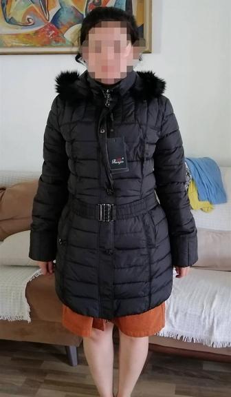 Продам пуховик новый