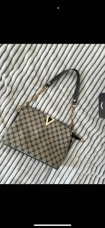 Продам женскую сумку коричневую